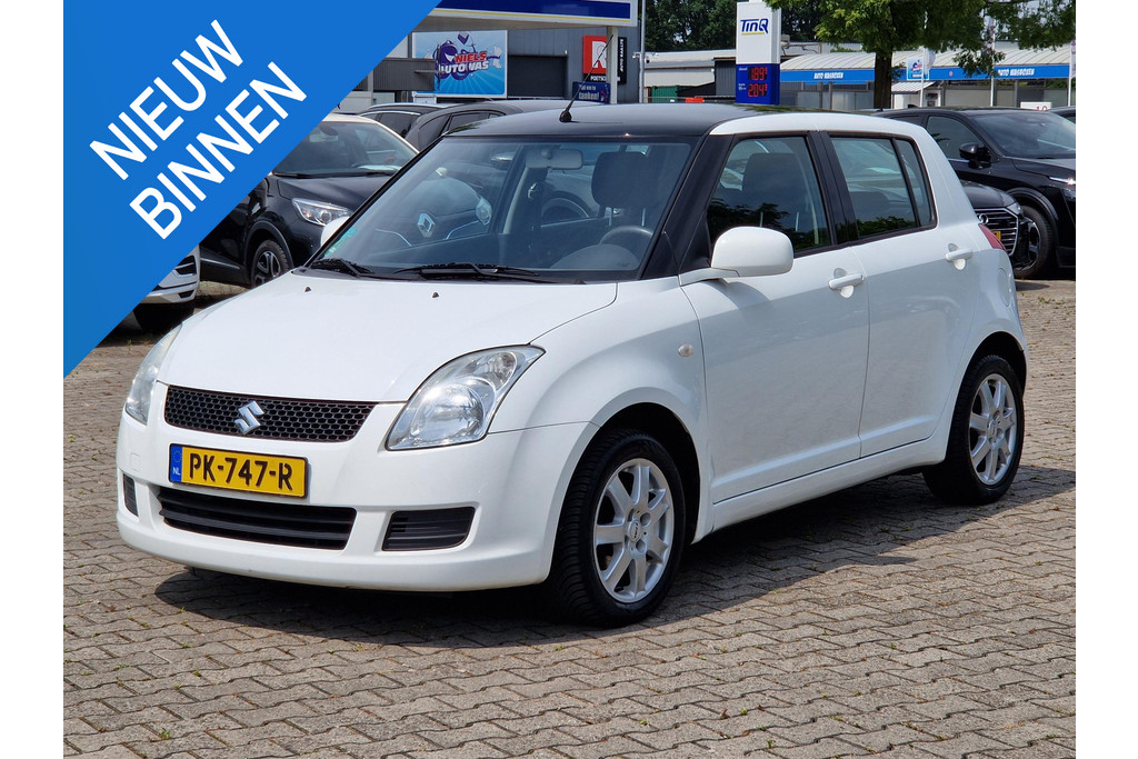 Suzuki Swift 1.3 Base 5-DEURS AIRCO ELEK.RAMEN NW APK 54621868-0.jpg | Autobedrijf Gerard Vulink